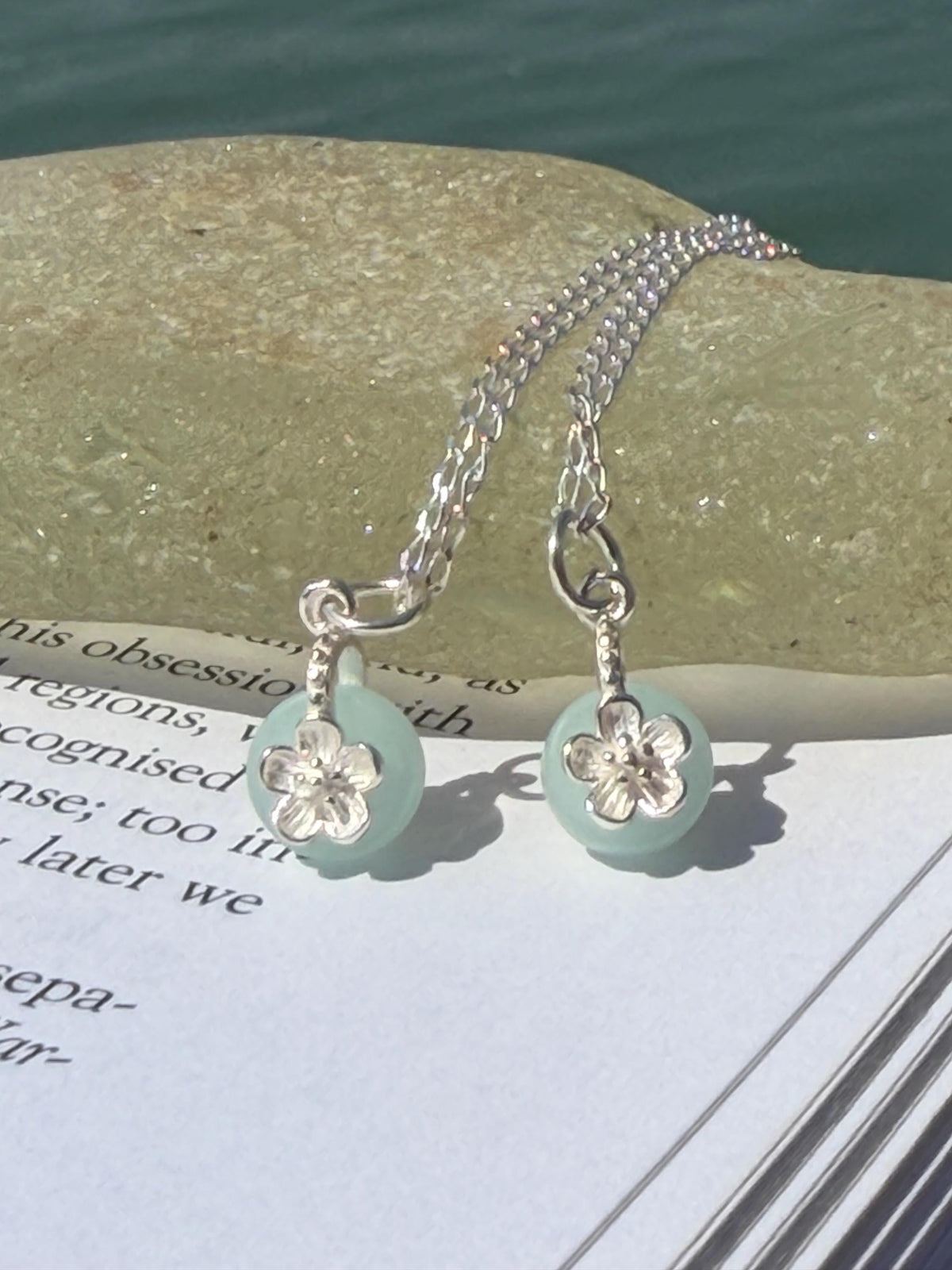 Dainty little recycled glass necklace within sterling silver flower. Recycled necklace. Ethical jewellery. glass pendant. Eco friendly gifts