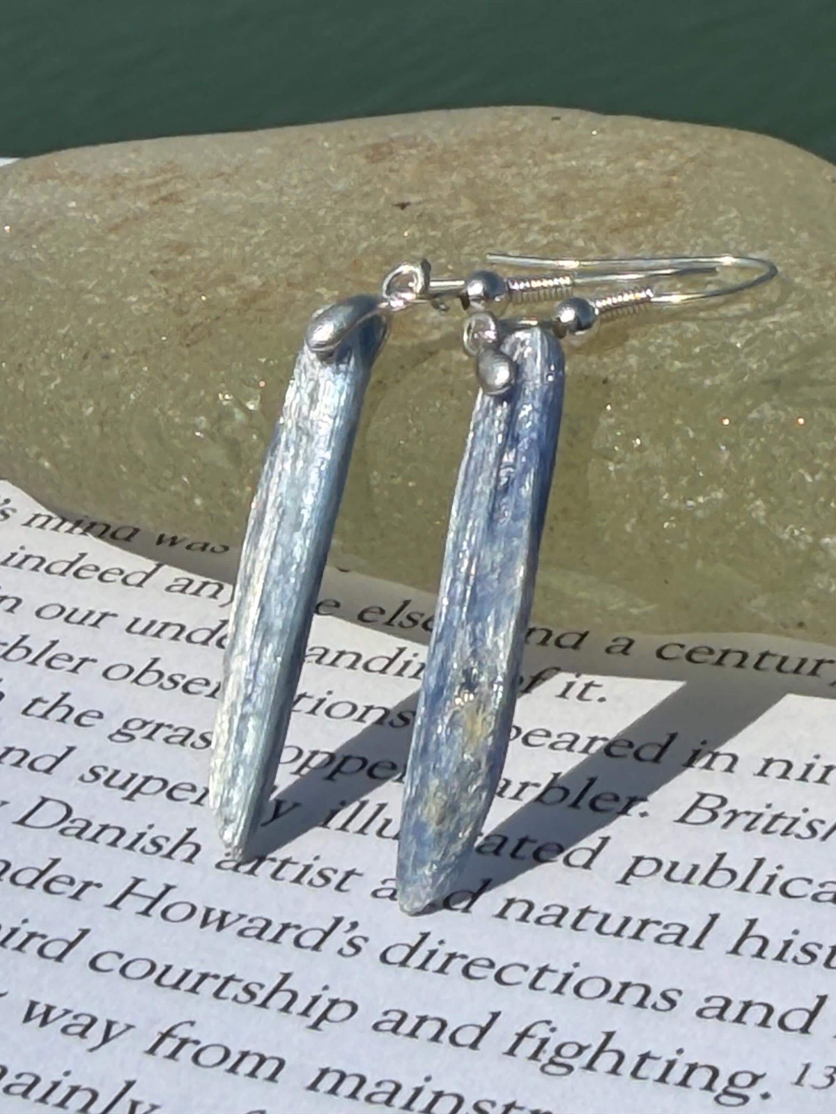 Blue kyanite earrings hung on recycled sterling silver. Angel wing earrings. Unique jewellery. handmade unusual jewellery, ethically made.