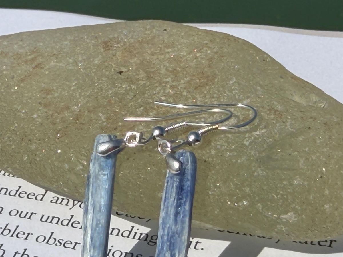 Blue kyanite earrings hung on recycled sterling silver. Angel wing earrings. Unique jewellery. handmade unusual jewellery, ethically made.