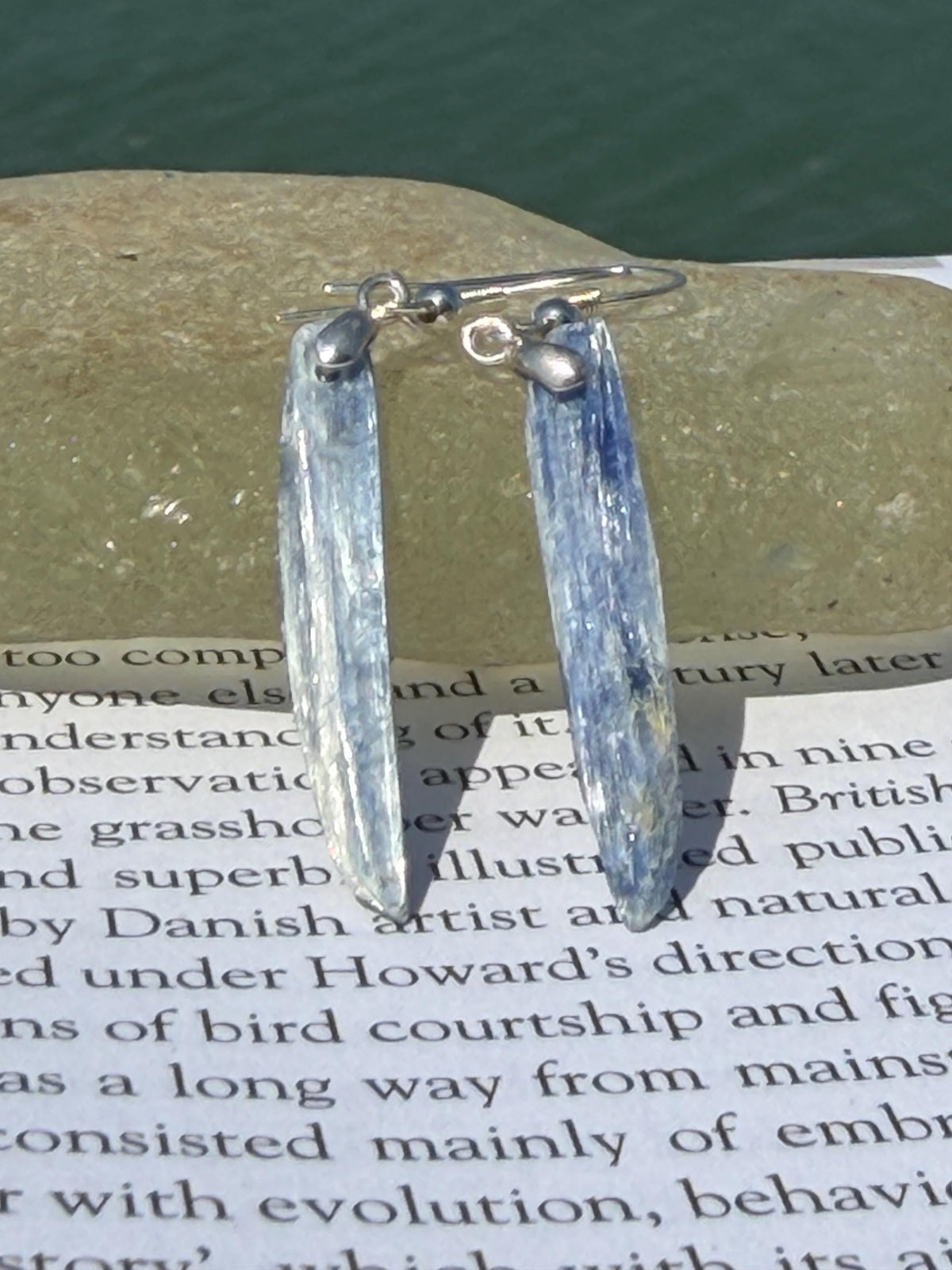 Blue kyanite earrings hung on recycled sterling silver. Angel wing earrings. Unique jewellery. handmade unusual jewellery, ethically made.