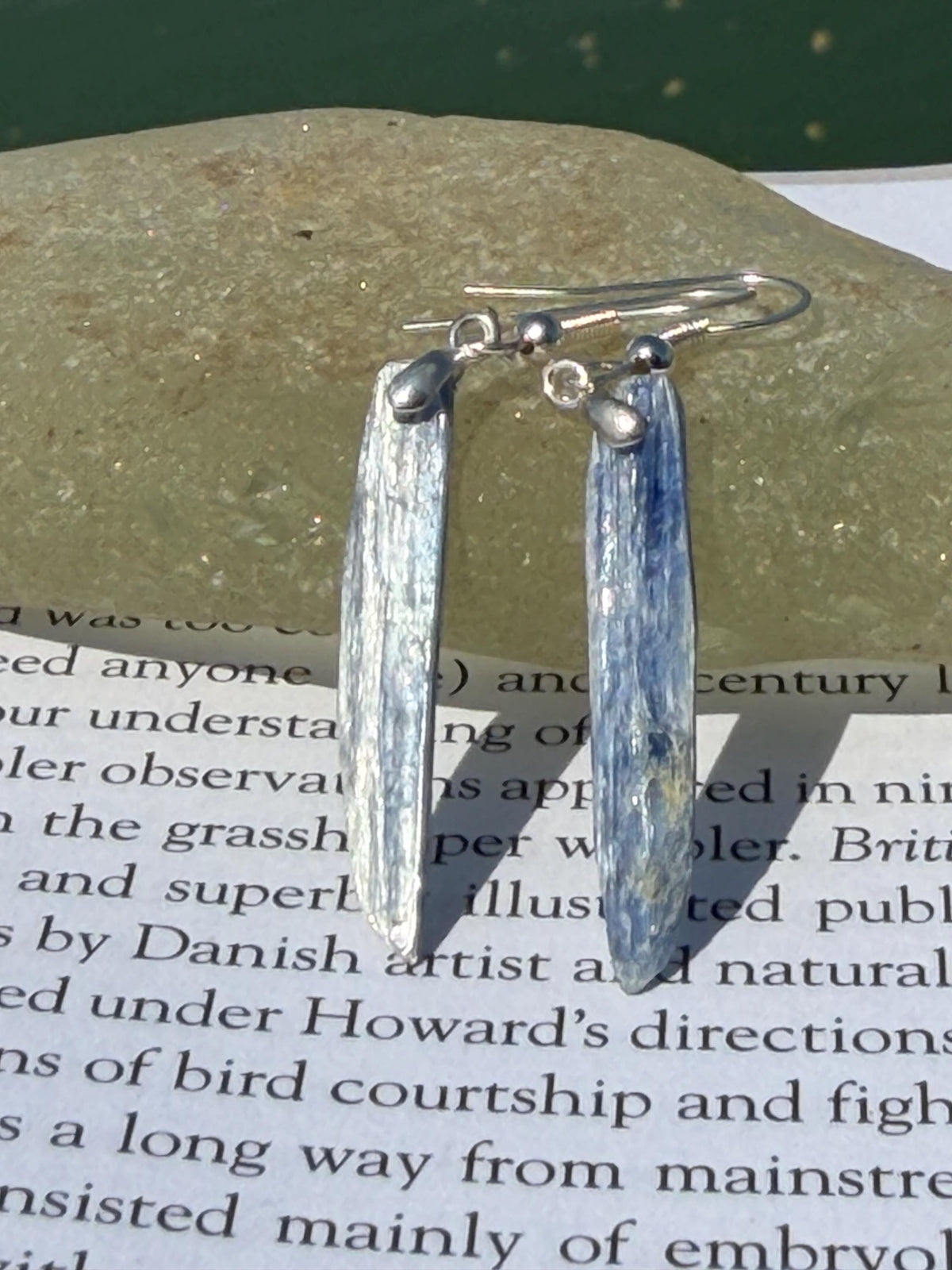 Blue kyanite earrings hung on recycled sterling silver. Angel wing earrings. Unique jewellery. handmade unusual jewellery, ethically made.