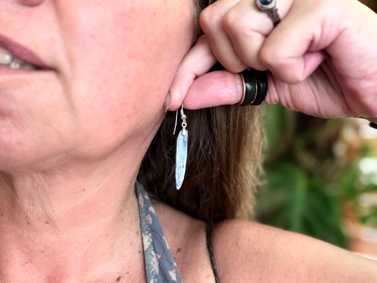 Blue kyanite earrings hung on recycled sterling silver. Angel wing earrings. Unique jewellery. handmade unusual jewellery, ethically made.