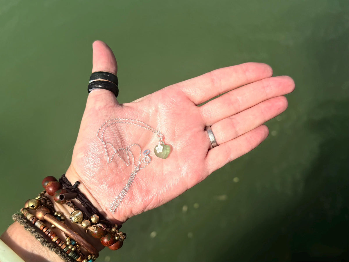 Dainty little sea glass necklace within sterling silver flowers. Recycled necklace. Ethical jewellery. Sea glass pendant. Eco friendly gifts