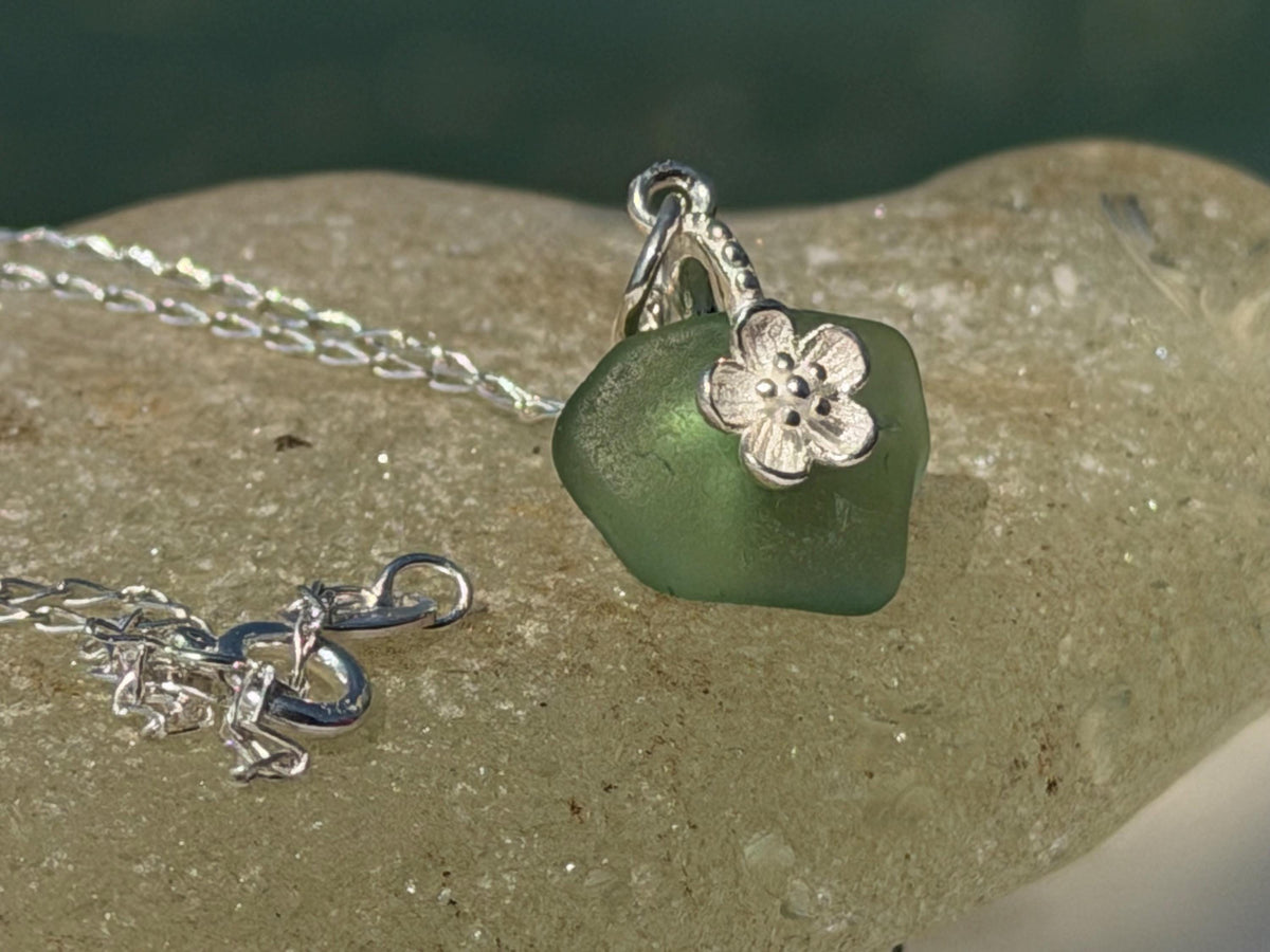 Dainty little sea glass necklace within sterling silver flowers. Recycled necklace. Ethical jewellery. Sea glass pendant. Eco friendly gifts