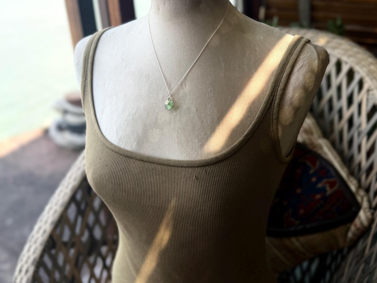 Dainty little sea glass necklace within sterling silver flowers. Recycled necklace. Ethical jewellery. Sea glass pendant. Eco friendly gifts