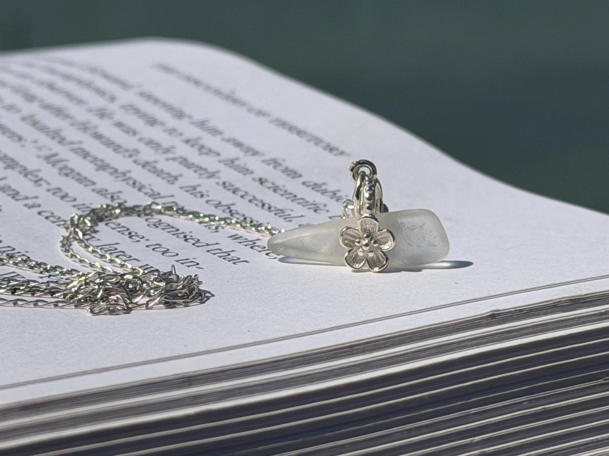 Dainty little sea glass necklace within sterling silver flowers. Recycled necklace. Ethical jewellery. Sea glass pendant. Eco friendly gifts