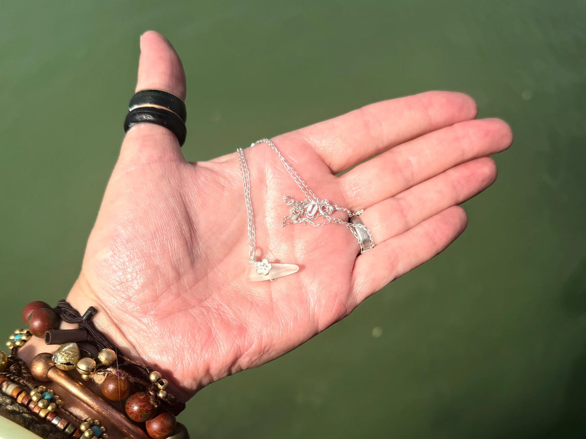 Dainty little sea glass necklace within sterling silver flowers. Recycled necklace. Ethical jewellery. Sea glass pendant. Eco friendly gifts