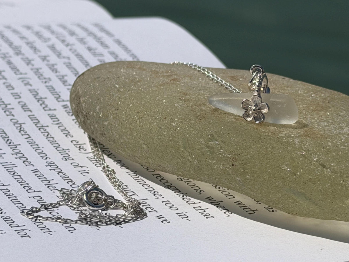 Dainty little sea glass necklace within sterling silver flowers. Recycled necklace. Ethical jewellery. Sea glass pendant. Eco friendly gifts
