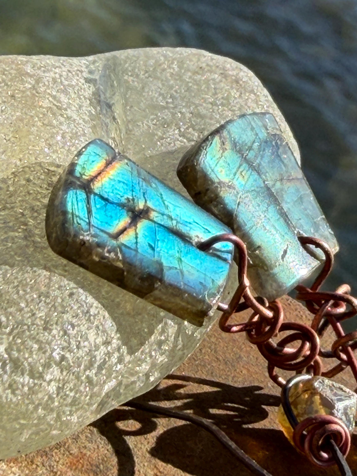 Ethically sourced labradorite earrings held on recycled copper. Ethical eco friendly  jewellery, labradorite jewellery. Boho unique earrings