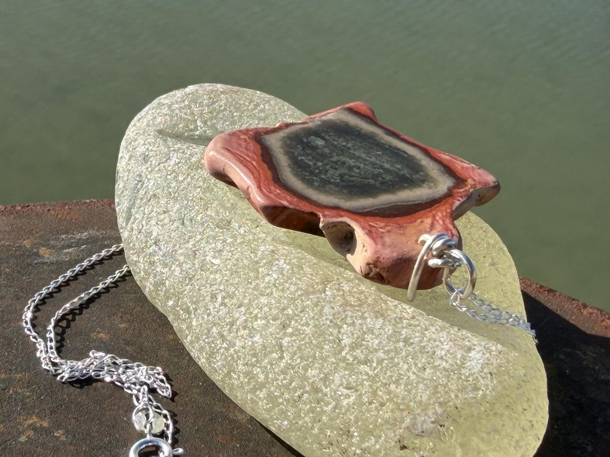 Eco friendly handmade necklace made from Rhodochrosite & recycled silver. Ethical jewellery. Unique handmade jewellery. Orange necklaces.