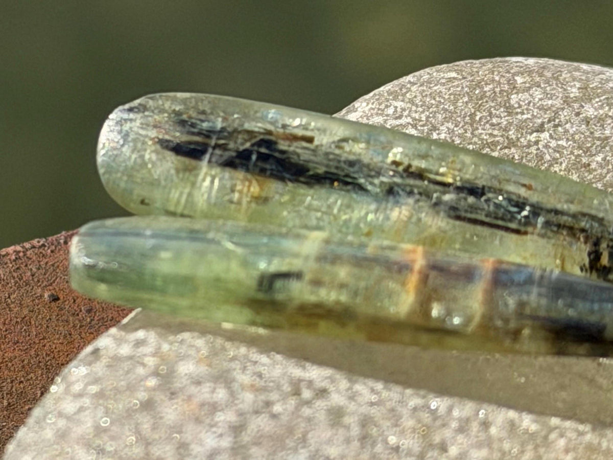 Green kyanite earrings hung on recycled copper. Unique gemstone jewellery. handmade unusual jewellery, ethically made. Eco friendly earrings