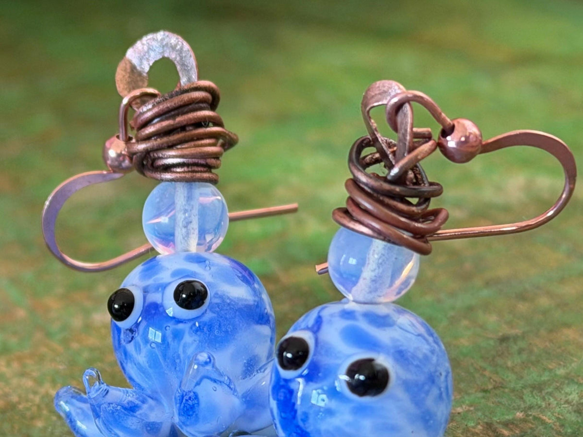 Glass octopus earrings made from recycled copper and glass. Octopus jewellery. Handmade earrings. Eco friendly jewellery.