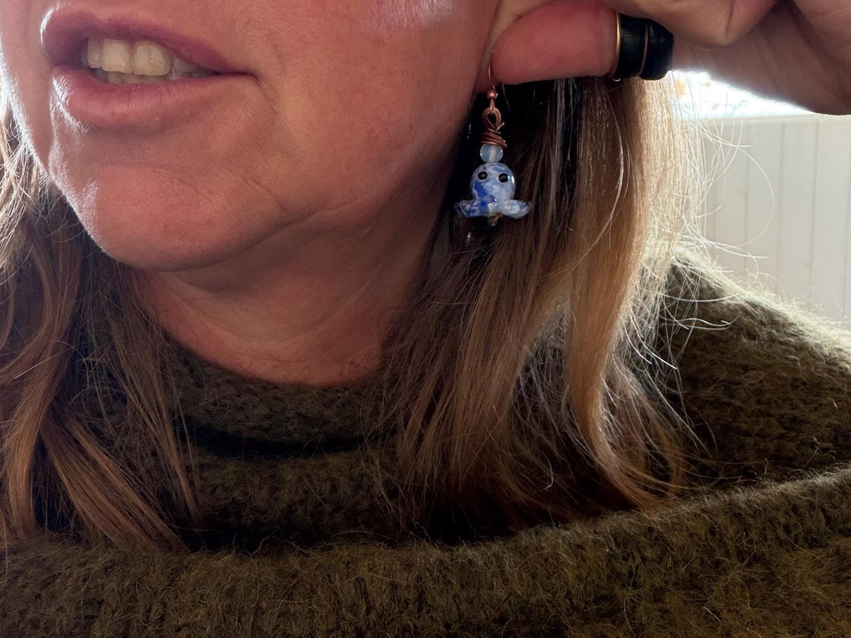 Glass octopus earrings made from recycled copper and glass. Octopus jewellery. Handmade earrings. Eco friendly jewellery.